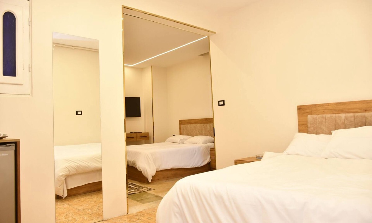 Al Haram Hotel | 2 street ibrahim afifi elmansouria