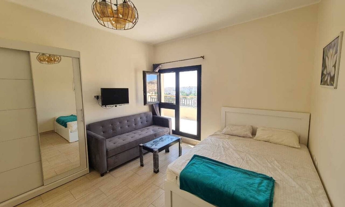 Village Road Apartment | AlDau Heights Modern Studio with Huge Terrace, Mountain & City View