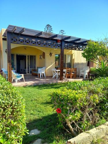 Marina El Alamein Ski Chalet | Chalet with garden -sea view cleopatra village - kilo 86 - north coast