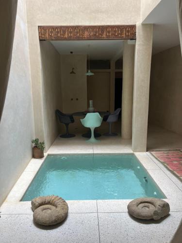 Douar Sidi Youssef Ben Ali House | Dar Alma Modernist Designer Riad with Pool