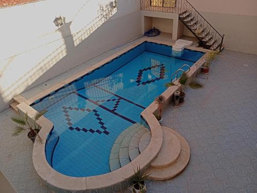 Village Road Apartment | Lägenhet i villa med pool i Hurghada-Magawish