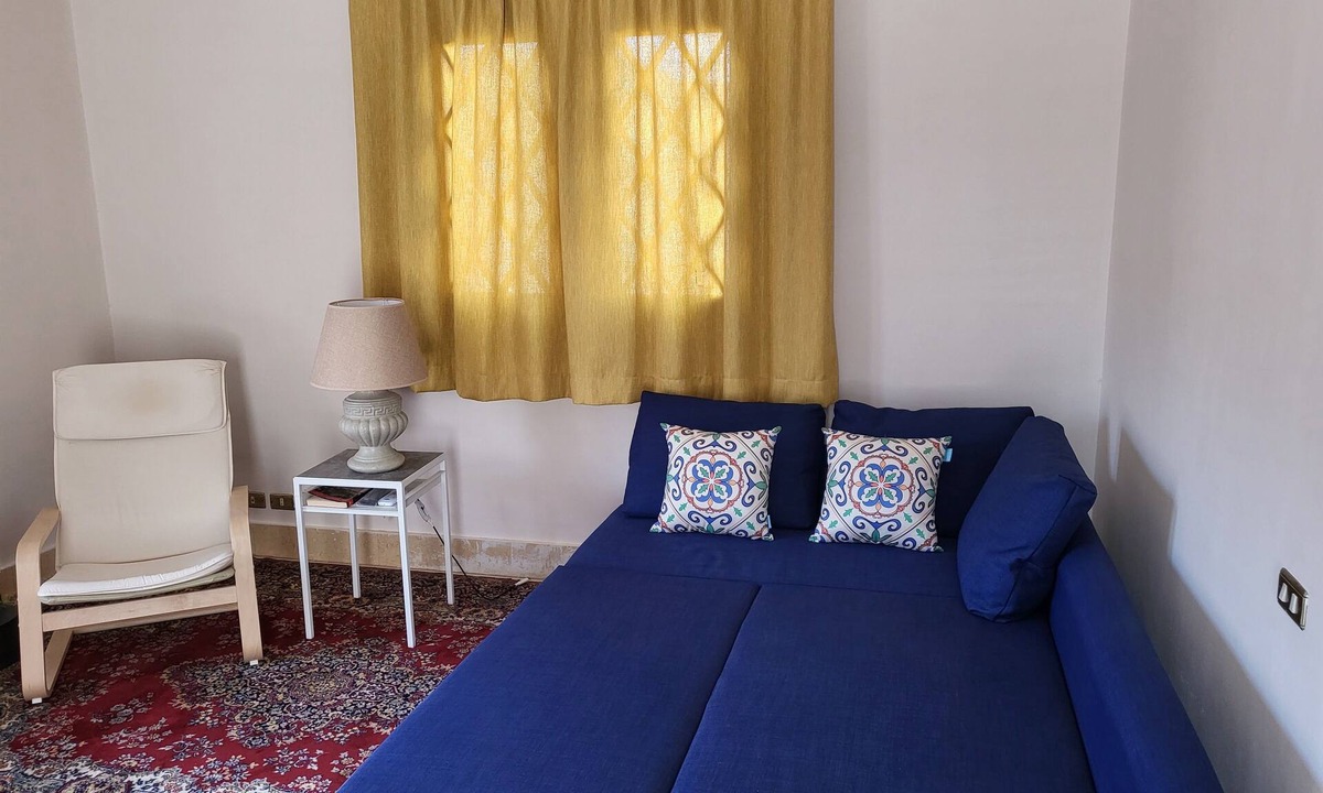 Al Rehab Apartment | Lovely one-bedroom condo with garden view