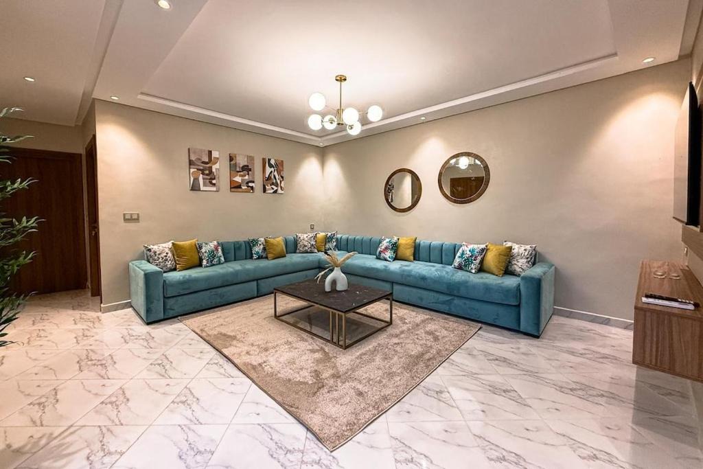 Al Hoceima Apartment | Luxury Apartment with Private Patio & City Charm - Buena Vista Residences
