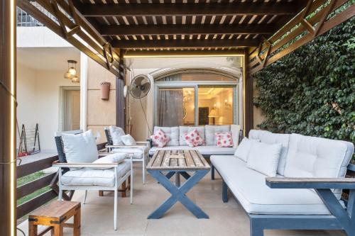 Cairo Apartment | Modern 2BR Apartment with Private Garden Patio, Stone Residence New Cairo