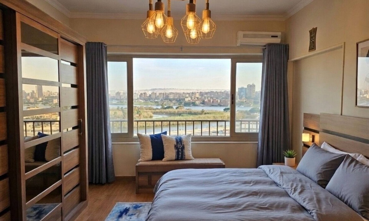 Giza Apartment | Panoramic Nile and Pharaonic Village View-1st Line