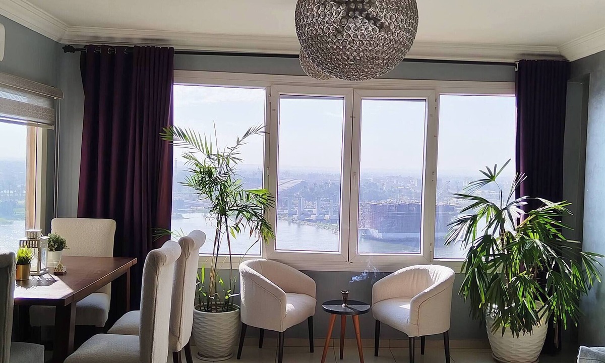 Maadi Apartment | The Traveler Nile and Pyramid View Magical Sunrises, Historic Wonders