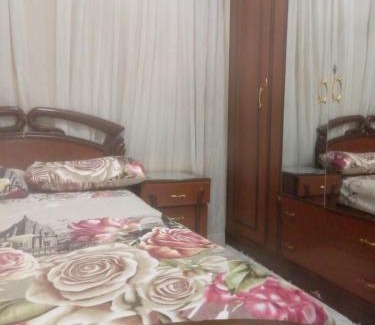 Al Duqqi Apartment | شقه مفروشه بالكامل بالدقى مكيفه غرفة نوم وصاله