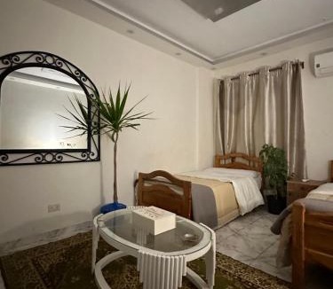 Al-Muntazah Apartment | شقه بصاله سينمائية وغرفتين نوم Cinema hall