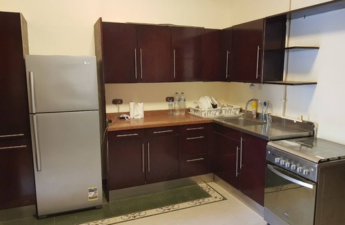 The 5th Settlement Apartment | A gorgeous high level ground apartment with private garden and private entrance.