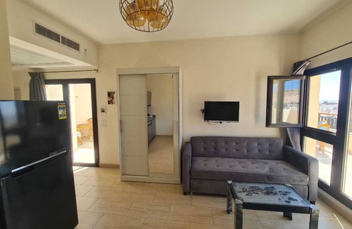 Village Road Apartment | AlDau Heights Modern Studio with Huge Terrace, Mountain & City View