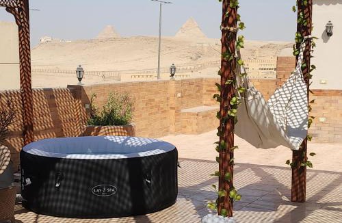Pyramids Gardens Apartment | Amazing view with hot jacuzzi and private rooftop
