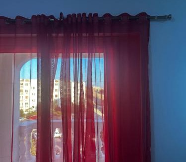 Village Road Apartment | Bright apartment with sea and airport views Mubarak 2