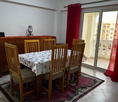 Village Road Apartment | Bright apartment with sea and airport views Mubarak 2