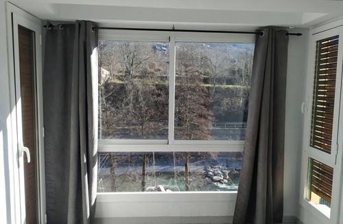 Sort Condo | Central apartment with river views
