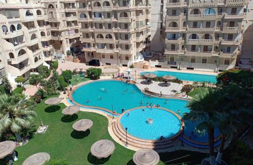 Al-'Amriyah Apartment | Chalet with pool view At Al Nakhil resort