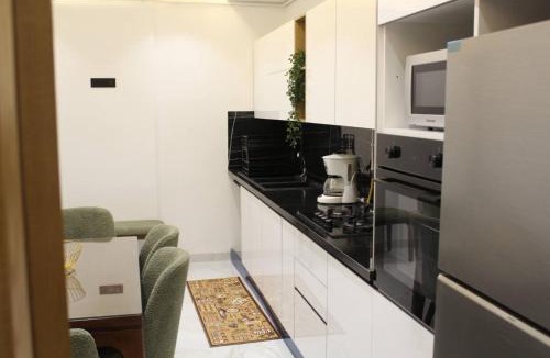 Sidi Daoud Apartment | Charming 2-Bedroom Apartment in Central Tunis with Garden View