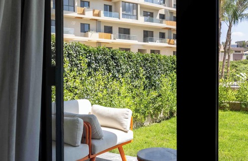 New Cairo Apartment | Chic 2-bedroom apartment with Private Garden + Pool view At Villette