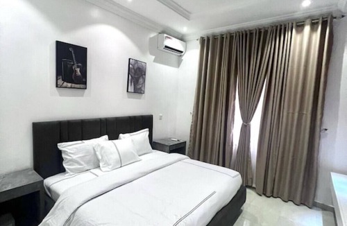Lekki Phase 1 Apartment | Cosy and warm secured apartment with large playground for vacation