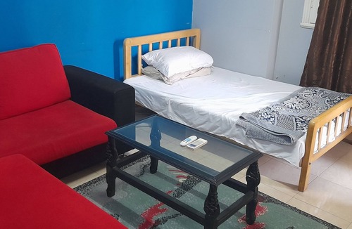 Qasr an-Nil Apartment | Double or single room with shared toilet ideal for short stays ,1 bed S+ Sofa D