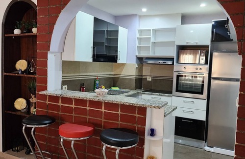 Aousja Apartment | Duplex Bien Equipe Securise Avec Jardin et Veranda