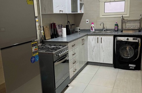 6th of October City Apartment | Elite House: Elegant 3BR Terrace Suite Steps from Mall of Arabia.