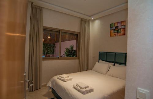 El Hara Apartment | Hanna Modern - Patio & BBQ - Wifi - Center - AC