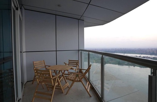 Al-Basatin Apartment | Hotel apartment in Hilton Nile Maadi with a charming Nile and pyramids view