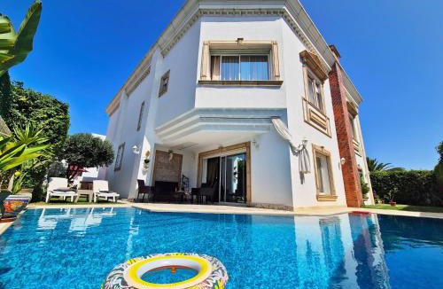 Les Berges Du Lac II House | L'Orchidée - Suites de Luxe avec Piscine Chauffée et Vue sur le Lac de Tunis