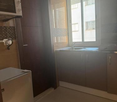 Sfax Apartment | Les portes délavées