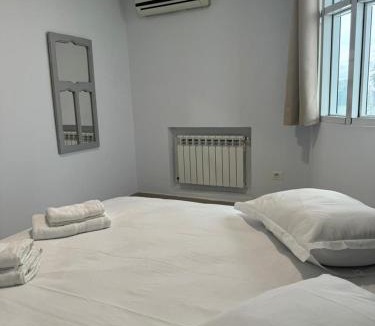 Sfax Apartment | Les portes grisées