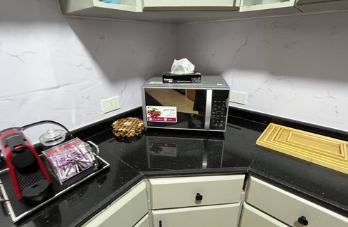 Al Duqqi Apartment | Luxury 3-bedroom apartment in Mohandseen with AC, WiFi