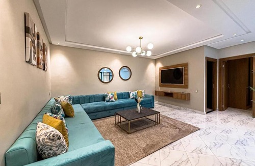 Al Hoceima Apartment | Luxury Apartment with Private Patio & City Charm - Buena Vista Residences