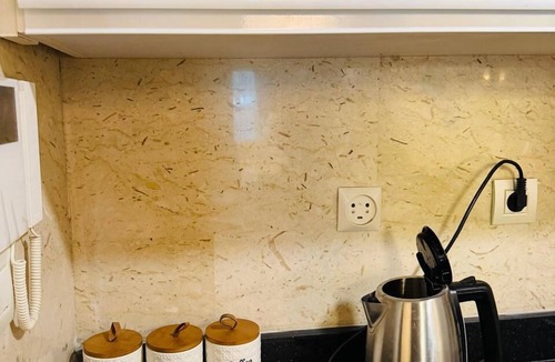 Cairo Apartment | Luxury hotel apartment with a charming view of the Nile and the pyramids