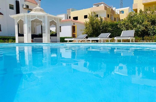 Village Road Villa | Magawish villa in the heart of the city