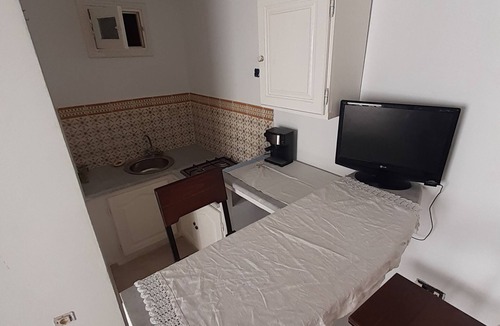 Borj Erras House | Maison d'hôte Albatros Guest room with private bathroom and court view