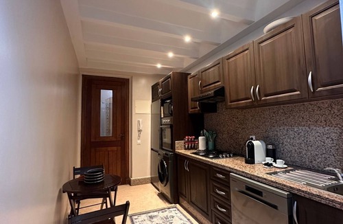 Agdal Apartment | Marrakech Oasis 2-bedroom apartment with direct garden and pool access with AC