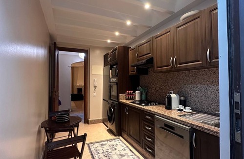 Agdal Apartment | Marrakech Oasis 2-bedroom apartment with direct garden and pool access with AC