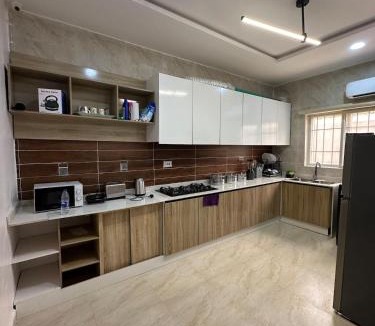 Ofin House | Modern 4BR Duplex Near VGC in a Secure Estate with Gym & Pool