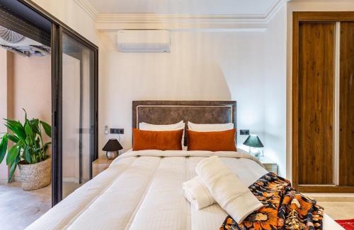 Semlalia Apartment | Modern Oasis in Heart of Guéliz Pool & Balcony
