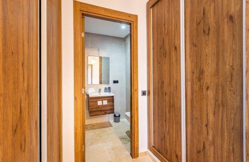 Semlalia Apartment | Modern Oasis in Heart of Guéliz Pool & Balcony