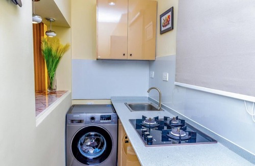 Lekki Phase 1 Apartment | New Luxury Game Oasis: Wi-Fi,PS5,King Bed with a Double Bed 2 bedroom and 2 bath
