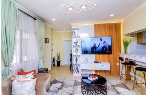 Lekki Phase 1 Apartment | New Luxury Game Oasis: Wi-Fi,PS5,King Bed with a Double Bed 2 bedroom and 2 bath