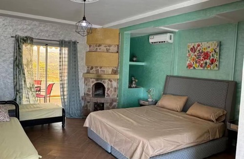 Ouzoud Bed & Breakfast | Room with veranda terrace.