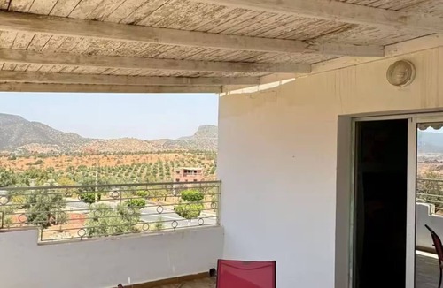 Ouzoud Bed & Breakfast | Room with veranda terrace.