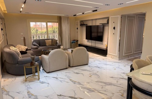 Giza Apartment | Spacious 3-bedroom apartment in tranquil Giza Governorate with AC