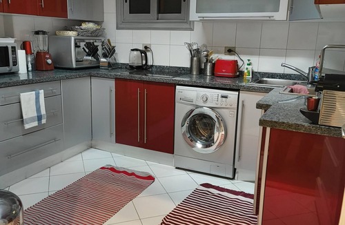 Al Duqqi Condo | Spacious 3-bedroom condo in lovely Giza Governorate with AC and fitness room
