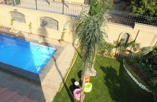 Giza Governorate Villa | Spacious 6-bedroom mansion in enjoyable 6th of October City with WiFi, AC