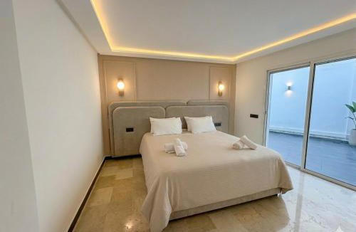 Racine Apartment | Spacious apartment with private terrace and secure parking in the heart of Casablanca