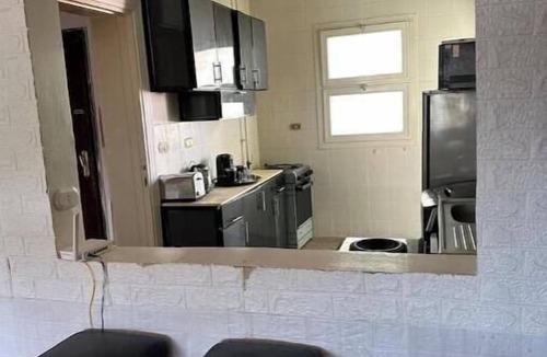 6th of October City Apartment | Stylish & Sunny 2BR Retreat – Spacious Living with Large Pool Access
