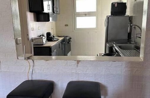 6th of October City Apartment | Stylish & Sunny 2BR Retreat – Spacious Living with Large Pool Access